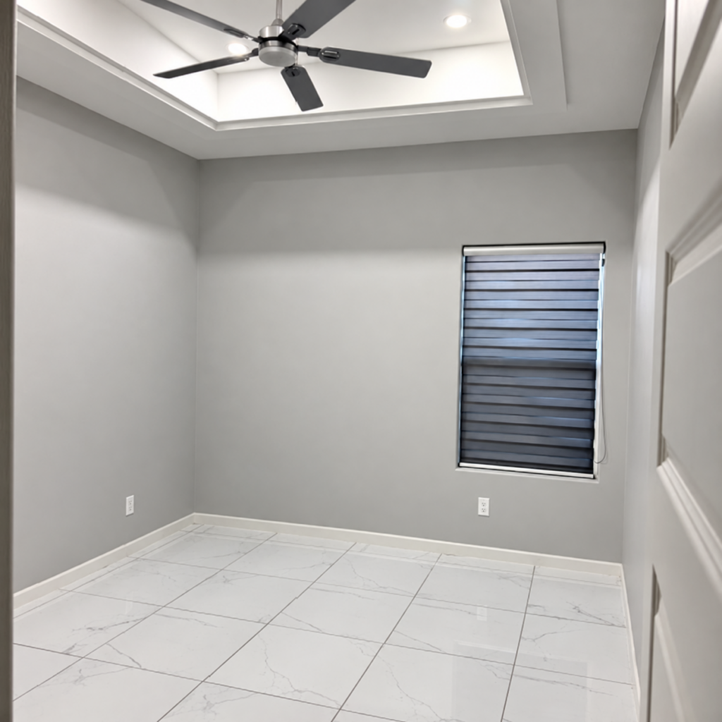 Bedroom with ceiling fan and window shade